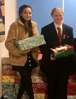 Inspirational students send record number of shoe boxes to help East European families.