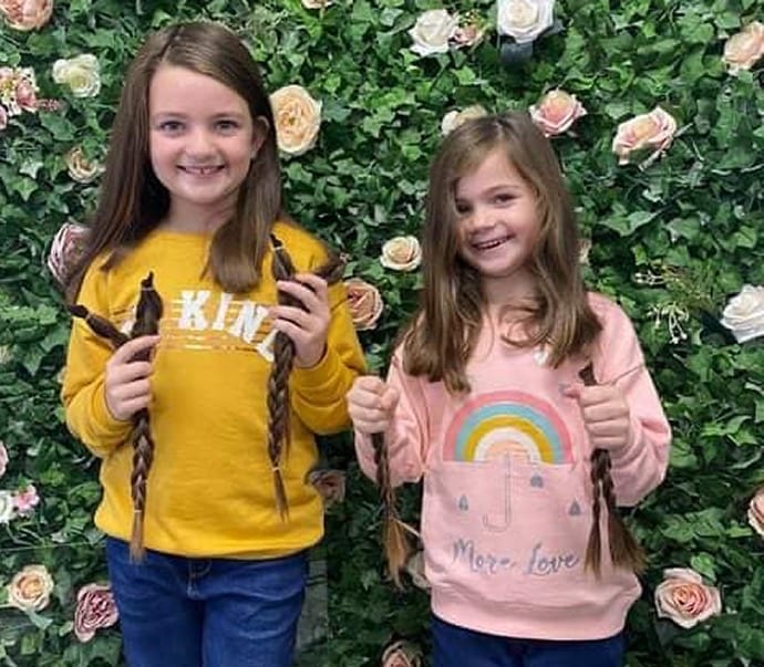 Inspirational Lily and Emee cut off hair to help charity