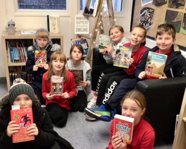 Pupils relishing reading at excellent school