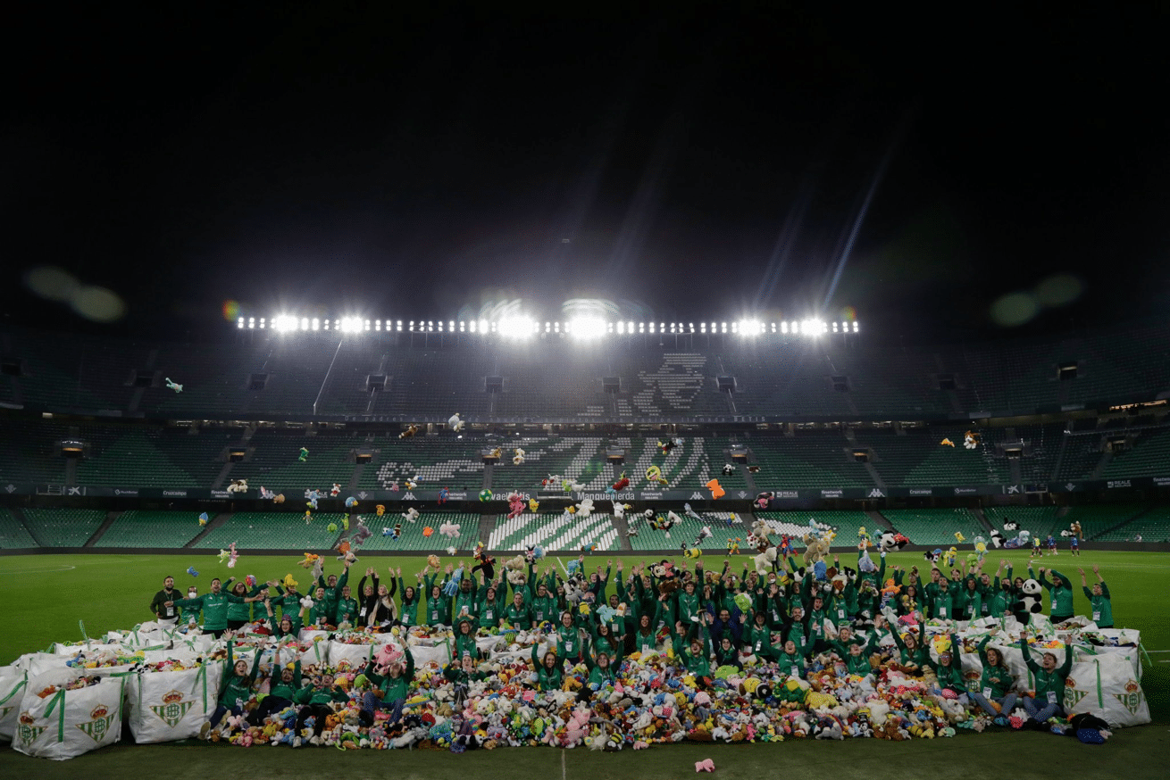 Wow! Fans toss 19,000 toys on football pitch for Christmas kids good news giveaway
