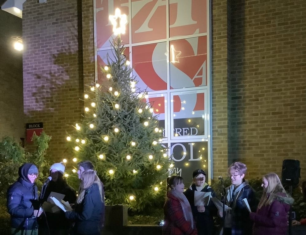 Students, staff, and parents spread festive cheer at Christmas light switch on