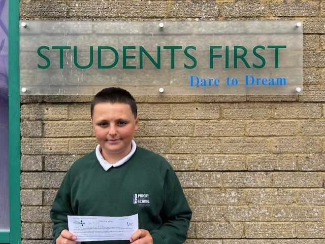 Sam, 12, runs uniform sale to generate donations for Foodbank