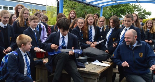 Students bring happiness and joy with song to teachers (By Rupert, 12)