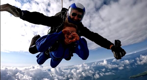 Staff skydive raises £1,000s for bereaved children