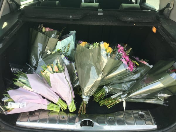 Sainsburys and TK Maxx give flowers and goodies to school staff