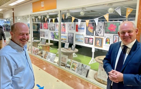 Senior councillor praises students for world-class community art exhibition