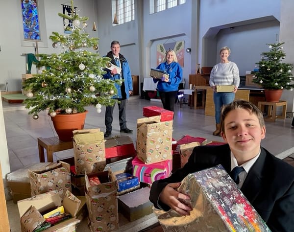 Fabulous Jared, 12, drives generosity Christmas parcel wrap for families in need at Christmas