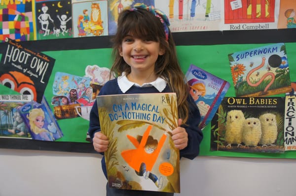 Inspirational pupils thriving in reading and writing after enjoying dozens of new books