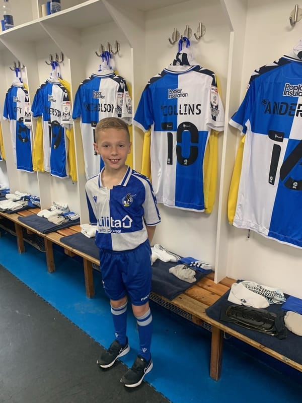 Brilliant Bailey, 8, signs for professional football team and celebrates by witnessing one of Britain’s best ever promotion victories 