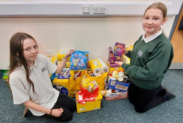 Teachers spread Christmas cheer by raising over £300 for Charity of the Year Foodbank